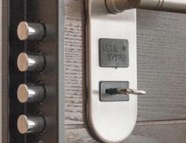 Quad dead bolt on front door of home.