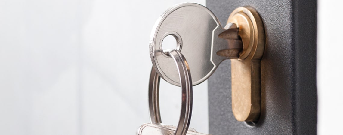 Key hanging out of a door lock