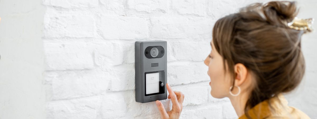 woman using home intercom