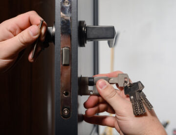 Installation of lock and door handle to interior doors, locksmith works with doors.