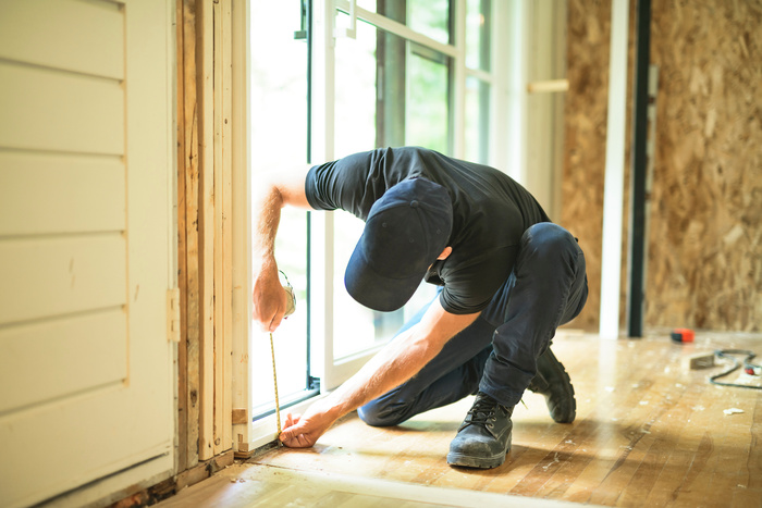 Expert working on sliding door repair in Fort Lauderdale