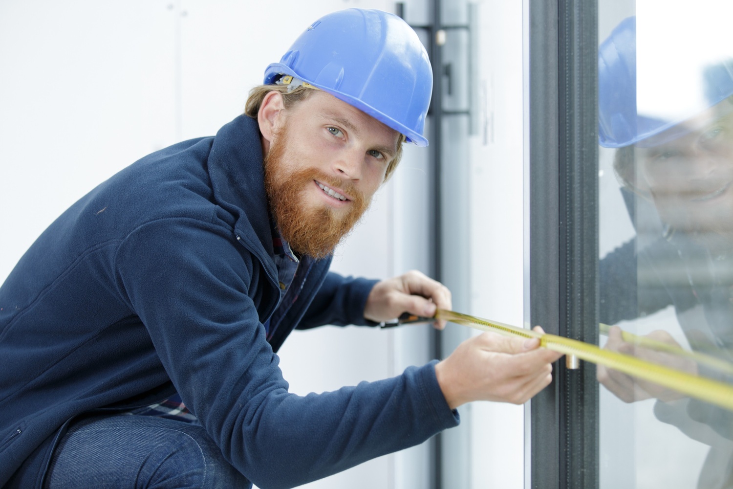 Angel Locksmith installing hurricane shutters